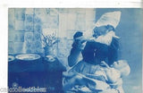 RPPC-Dutch Woman feeding Baby 1908 - Cakcollectibles - 1