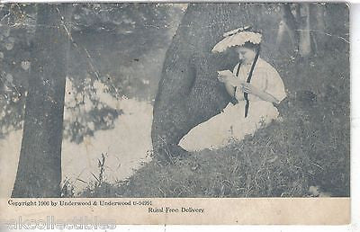 "Rural Free Delivery"-Woman sitting by tree reading letter UDB - Cakcollectibles