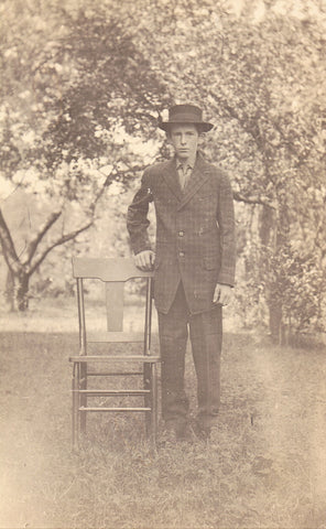 RPPC - Young Man Standing By A Chair