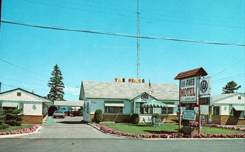 Front of vintage postcard The Pines Motel - Mackinaw City,Michigan