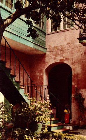 Vintage postcard front.Maison Montegut Courtyard - New Orleans,Louisiana
