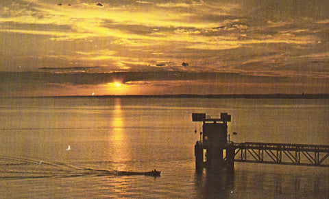 Vintage postcard front.Sunset on Lake McConaughy - Iowa