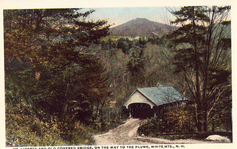 Vintage postcard front. Mt. Liberty and Old Covered Bridge - White Mts.,New Hampshire
